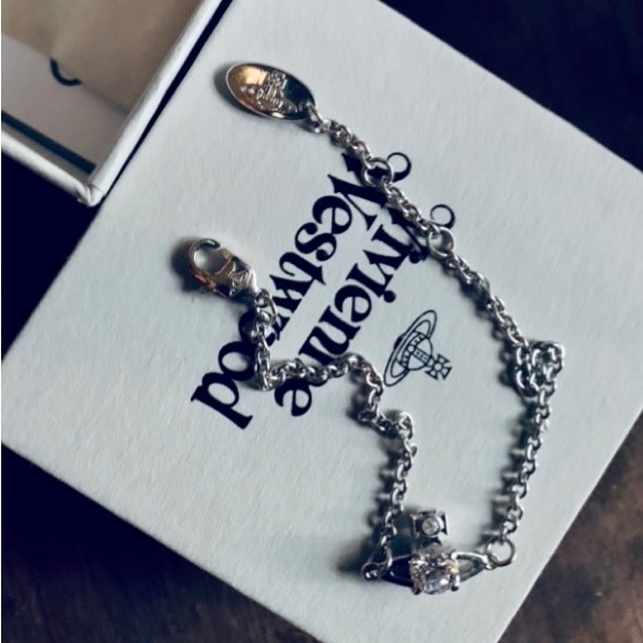 Vivienne Westwood Jewelry - Vivienne Westwood Bracelet w/box dust bag and papers.